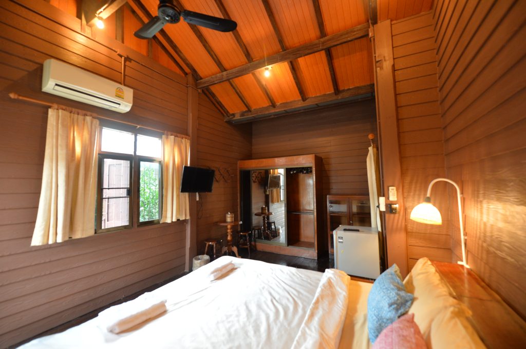 Traditional Thai style wooden bedroom