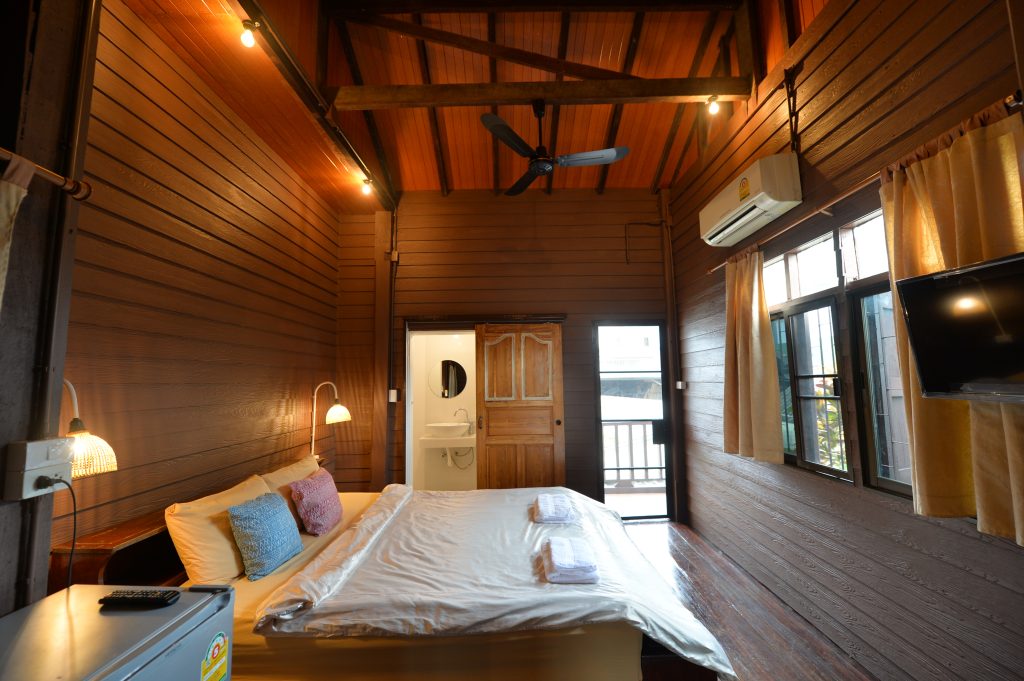 Traditional Thai style wooden bedroom