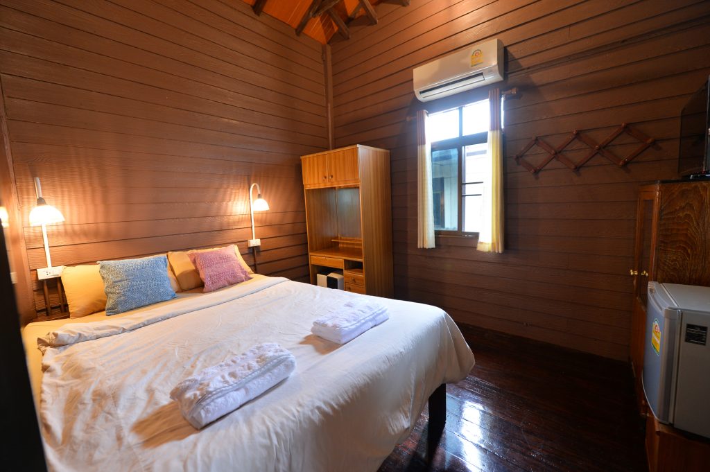 Traditional Thai style wooden bedroom